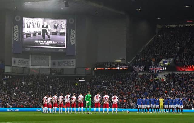 Rangers and RB Leipzig players during a minute silence for Rangers kit man Jimmy Bell before the UEFA Europa League semi-final, second leg (Picture: Andrew Milligan/PA Wire).