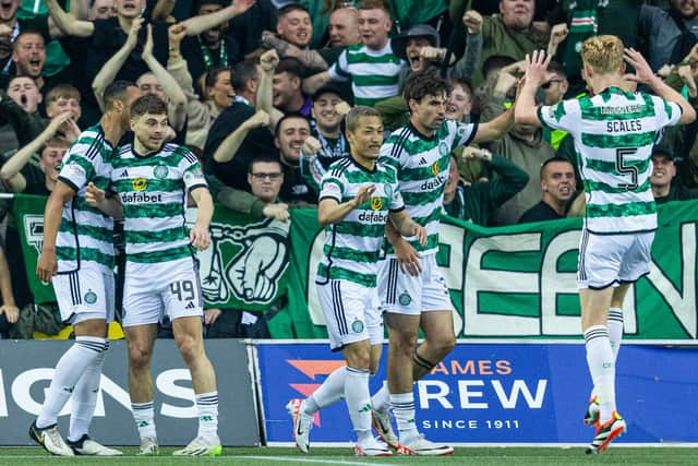 Celtic players celebrate after Daizen Maeda scores during the 5-0 win over Kilmarnock that clinched the title and an automatic Champions League spot. (Photo by Craig Foy / SNS Group)