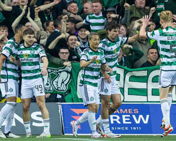 Celtic players celebrate after Daizen Maeda scores during the 5-0 win over Kilmarnock that clinched the title and an automatic Champions League spot. (Photo by Craig Foy / SNS Group)