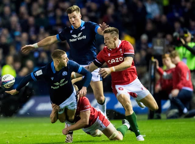 Finn Russell's brilliant offload created Kyle Steyn's first try in the win over Wales. (Photo by Ross Parker / SNS Group)
