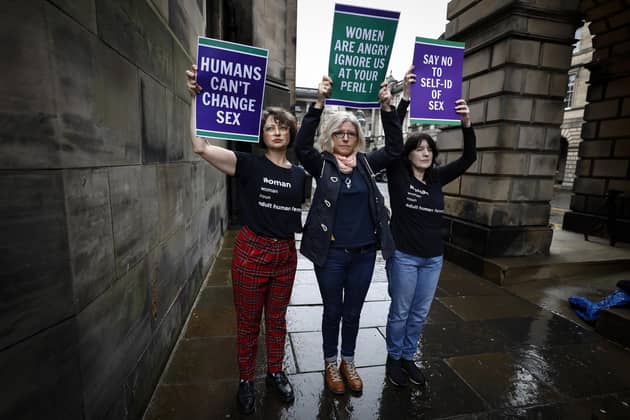 Members of the Scottish Feminist Network protest outside the Court of Session during a court hearing in September (Picture: Jeff J Mitchell/Getty Images)