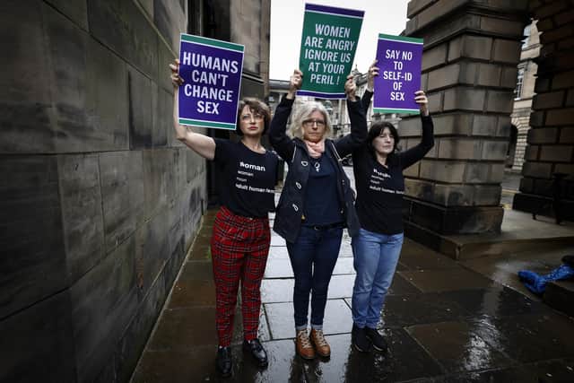 Members of the Scottish Feminist Network protest outside the Court of Session during a court hearing in September (Picture: Jeff J Mitchell/Getty Images)