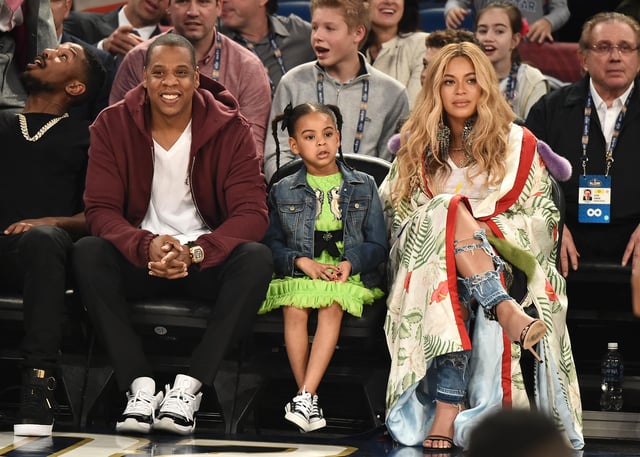 Jay Z, pictured with daughter Blue Ivy Carter and wife Beyoncé, is a huge sports fan. Picture: Theo Wargo/Getty Images