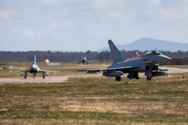 Royal Air Force Typhoons from 6 Sqn RAF Lossiemouth taxi towards the runway ready to depart  Photo credit should read: Sgt Keates/MoD