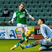 Dundee United goalkeeper Benjamin Siegrist saves an effort from Hibs striker Christian Doidge during their sides' draw at Easter Road. Photo by Ross Parker / SNS Group