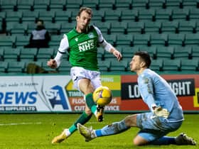 Dundee United goalkeeper Benjamin Siegrist saves an effort from Hibs striker Christian Doidge during their sides' draw at Easter Road. Photo by Ross Parker / SNS Group