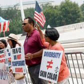 Anti-affirmative action activists with the Asian American Coalition for Education protest outside the U.S. Supreme Court Building on June 29, 2023 in Washington, DC. In a 6-3 vote, Supreme Court Justices ruled that race-conscious admissions programs at Harvard and the University of North Carolina are unconstitutional, setting precedent for affirmative action in other universities and colleges.