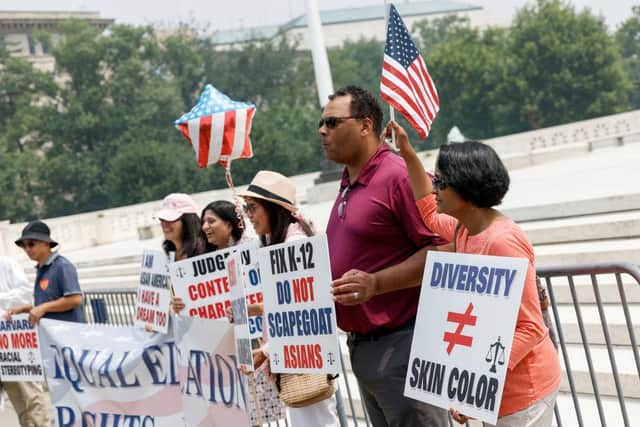 Anti-affirmative action activists with the Asian American Coalition for Education protest outside the U.S. Supreme Court Building on June 29, 2023 in Washington, DC. In a 6-3 vote, Supreme Court Justices ruled that race-conscious admissions programs at Harvard and the University of North Carolina are unconstitutional, setting precedent for affirmative action in other universities and colleges.