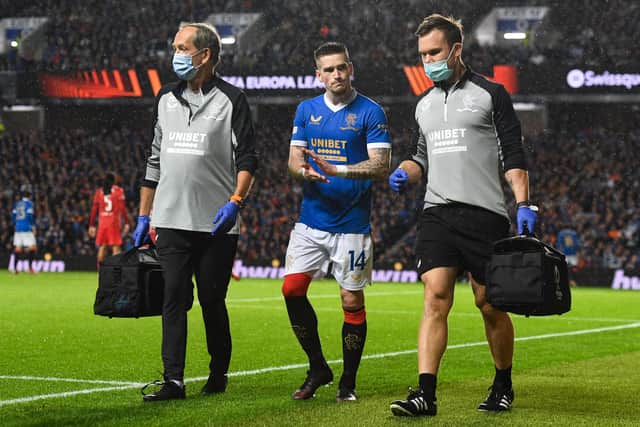 Rangers' Ryan Kent leaves the field with a hamstring injury during the Europa League defeat to Lyon at Ibrox. (Photo by Craig Foy / SNS Group)