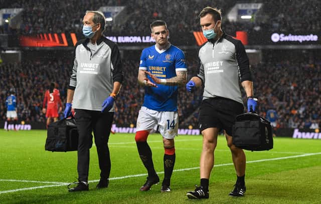 Rangers' Ryan Kent leaves the field with a hamstring injury during the Europa League defeat to Lyon at Ibrox. (Photo by Craig Foy / SNS Group)