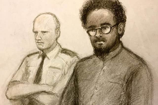 Court artist sketch by Elizabeth Cook of Ali Harbi Ali, in the dock during his trial at the Old Bailey