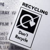 A 'Don't Recycle' label on plastic packaging.