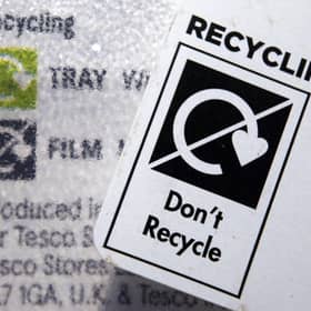 A 'Don't Recycle' label on plastic packaging.