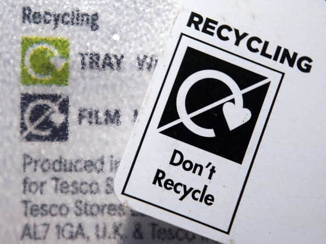 A 'Don't Recycle' label on plastic packaging.