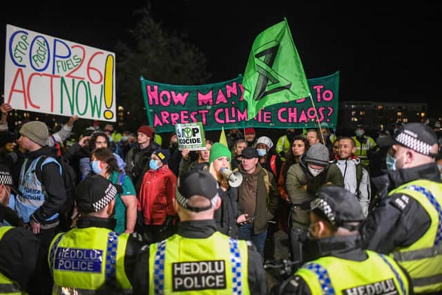 Police officers dealing with protesters in Glasgow at COP26. Picture: Peter Summers/Getty Images