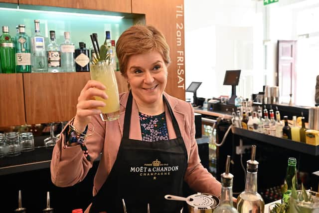 First Minister Nicola Sturgeon makes a cocktail in Fabric as she met with activists and local candidates during local election campaigning on April 30, in Dunfermline. Picture: Jeff J Mitchell-Pool/Getty Images