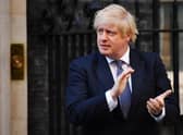 Boris Johnson applauds key workers, including the NHS staff who saved his life, outside 10 Downing Street last week (Picture: Leon Neal/Getty Images)