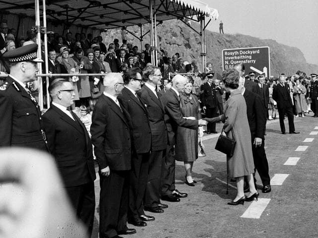 Queen Elizabeth II shakes hands with Sheriff Lillie when she officially opened the Forth Road bridge in September 1964.