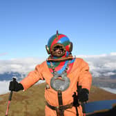 Veteran fundraiser Lloyd Scott, who is attempting to climb the Three Peaks whilst wearing a deep sea diving suit, during his challenge on Ben Nevis on Monday
