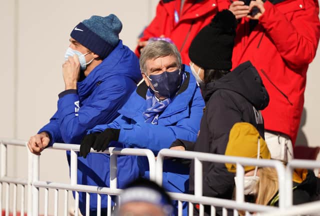 President of the International Olympic Committee, Thomas Bach speaks with Peng Shuai at Women's Freeski Big Air Final on day four of the Beijing 2022 Winter Olympic Games at the Big Air Shougang in China. February 8, 2022.