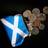 Money and a Scottish purse, as ministers are told to drop "vanity" independence spending and instead prioritise the cost-of-living crisis in the upcoming budget statement, the Scottish Conservatives have said. Picture: Jane Barlow/PA Wire