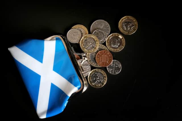Money and a Scottish purse, as ministers are told to drop "vanity" independence spending and instead prioritise the cost-of-living crisis in the upcoming budget statement, the Scottish Conservatives have said. Picture: Jane Barlow/PA Wire