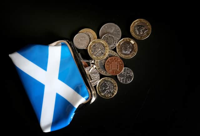 Money and a Scottish purse, as ministers are told to drop "vanity" independence spending and instead prioritise the cost-of-living crisis in the upcoming budget statement, the Scottish Conservatives have said. Picture: Jane Barlow/PA Wire