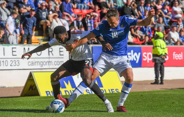 Aberdeen's Shayden Morris and St Johnstone's Andy Considine during Saturday's clash at McDiarmid Park.