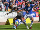 Aberdeen's Shayden Morris and St Johnstone's Andy Considine during Saturday's clash at McDiarmid Park.