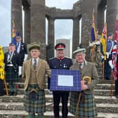 The Honourable Charles Pearson (right) and his son George Pearson (left) with the Lord Lieutenant of Kincardineshire Alastair Macphie beside the plaque (Pic: Carlo Williams)