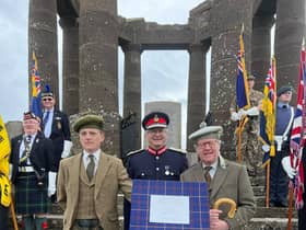 The Honourable Charles Pearson (right) and his son George Pearson (left) with the Lord Lieutenant of Kincardineshire Alastair Macphie beside the plaque (Pic: Carlo Williams)