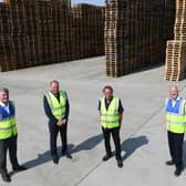 Kevin McNeilly, managing director at Scott Pallets reconditioned business unit,  brothers Shaun and Kevin McBride; Alan Gibson, managing director at Scott Pallets.