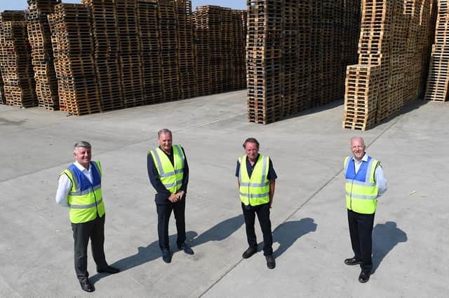 Kevin McNeilly, managing director at Scott Pallets reconditioned business unit, brothers Shaun and Kevin McBride; Alan Gibson, managing director at Scott Pallets.