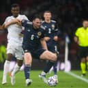 John Souttar holds off Armenia's Wbeymar during a Nations League match in June - the Rangers defender hasn't featured for Scotland for a year (Photo by Ross Parker / SNS Group)