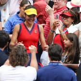 Emma Raducanu celebrates with her coaches after winning the US Open, but their working relationship is over.