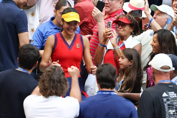 Emma Raducanu celebrates with her coaches after winning the US Open, but their working relationship is over.