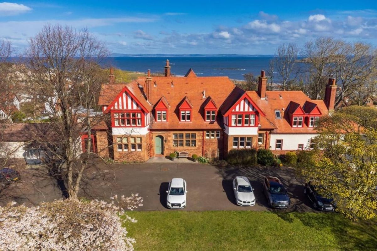 Sensational 5-bedroom flat for sale in vibrant coastal town with stunning interiors, roof terrace, private garden and fantastic sea views