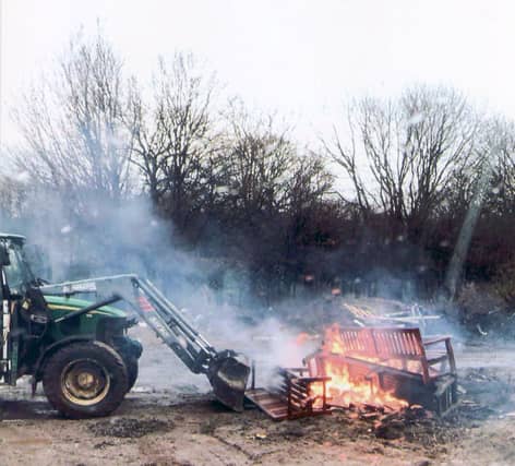 Memorial benches from Edinburgh's Princes Street Gardens are burned at a facility on the outskirts of the city.