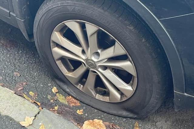 Lucy Conn's flat tyre, which was caused by climate activists deliberately puncturing it.