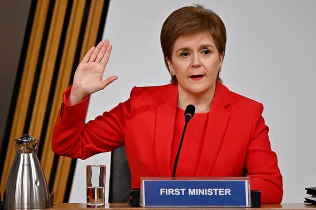 Nicola Sturgeon takes the oath before giving evidence to the MSPs' committee investigating the Scottish government's mishandling of harassment complaints about Alex Salmond (Picture: Jeff J Mitchell/PA)
