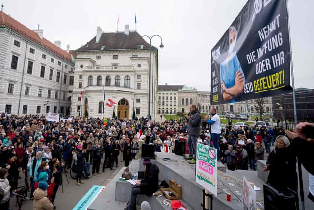 Anti-vaccination activists protest at the Ballhausplatz in Vienna, Austria, on November 14, after a Corona crisis' summit held by the Austrian government. Austrian Chancellor Alexander Schallenberg said that a nationwide lockdown would begin on November 15, for those not vaccinated against Covid-19 or recently recovered, as the EU member fights a record surge in cases.