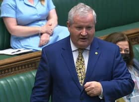 SNP Westminster leader Ian Blackford accused the Prime Minister of "pushing" to let the virus spread.