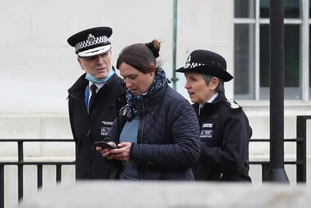 Metropolitan Police Commissioner Dame Cressida Dick (right) arrives at New Scotland Yard in London, the day after clashes between police and crowds who gathered on Clapham Common on Saturday night to remember Sarah Everard. Picture: Yui Mok/PA Wire