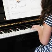 Scotland is 'rapidly moving' towards a situation where only children from wealthy families can learn to play a musical instrument, claims teaching union.