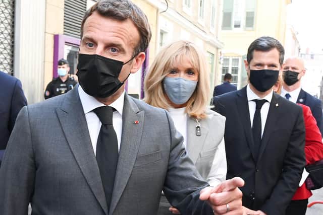 Emmanuel Macron: French President slapped in the face during visit to town