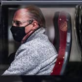 A passenger on a bus on Princess Street wears a face mask at the height of the Covid pandemic in 2020. Picture: Jeff J Mitchell/Getty Images