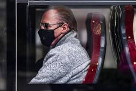 A passenger on a bus on Princess Street wears a face mask at the height of the Covid pandemic in 2020. Picture: Jeff J Mitchell/Getty Images