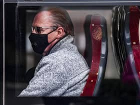 A passenger on a bus on Princess Street wears a face mask at the height of the Covid pandemic in 2020. Picture: Jeff J Mitchell/Getty Images