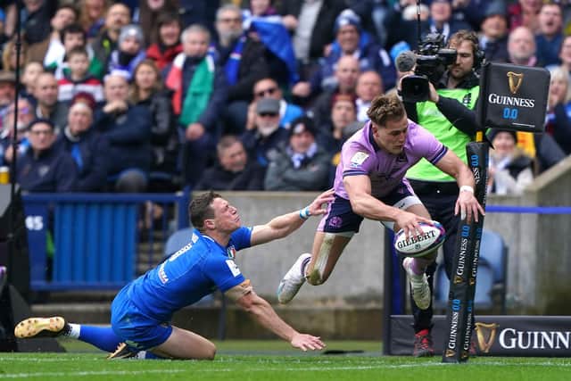Duhan van der Merwe is airborne as scores his spectacular try against Italy.  Picture: Andrew Milligan/PA Images