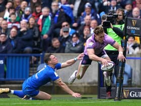 Duhan van der Merwe is airborne as scores his spectacular try against Italy.  Picture: Andrew Milligan/PA Images